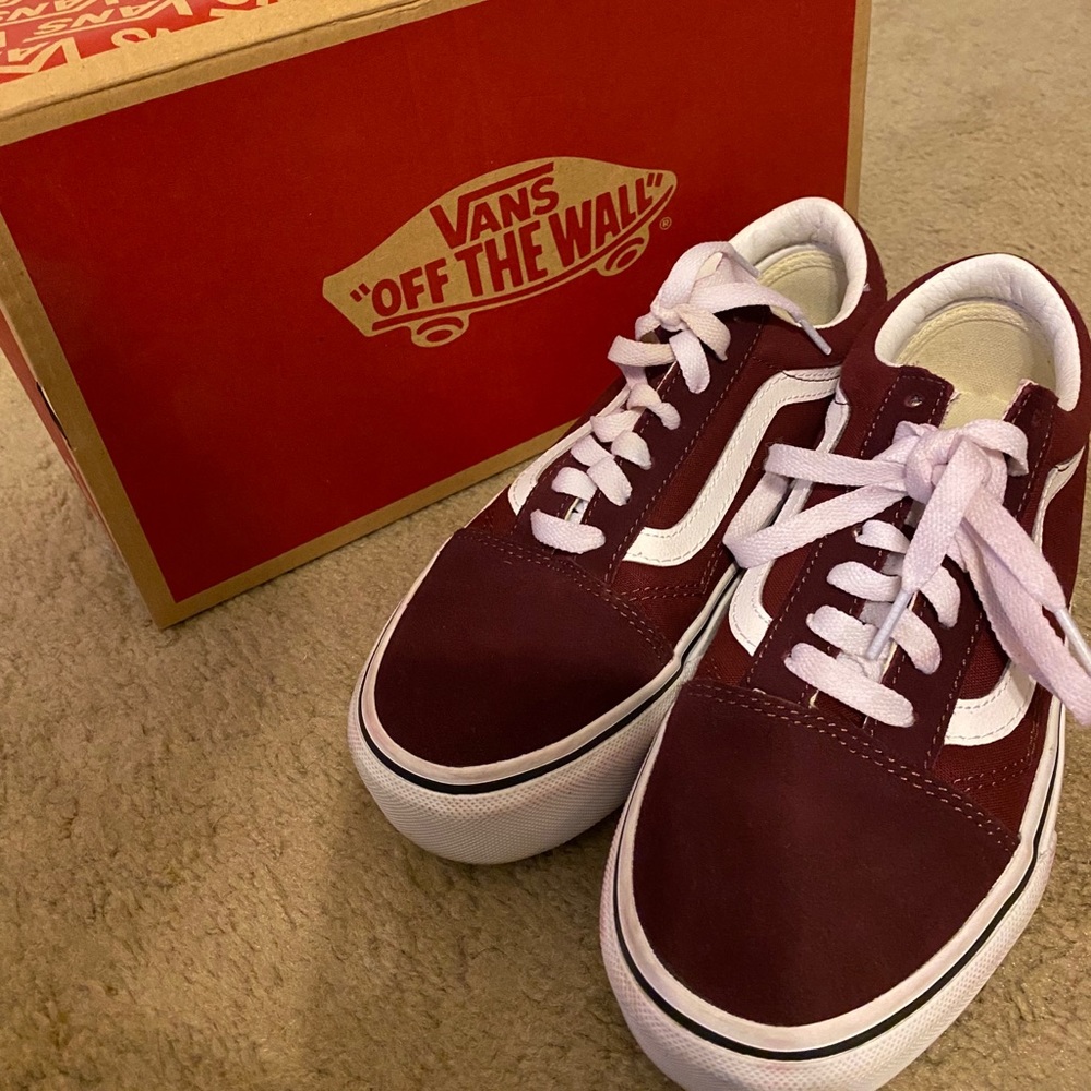 Burgundy old school platform vans.